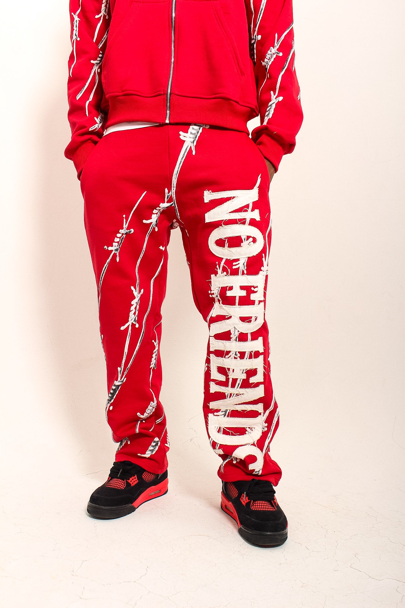 RED BARBED PANTS